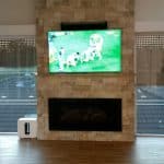Stone feature TV and Fireplace